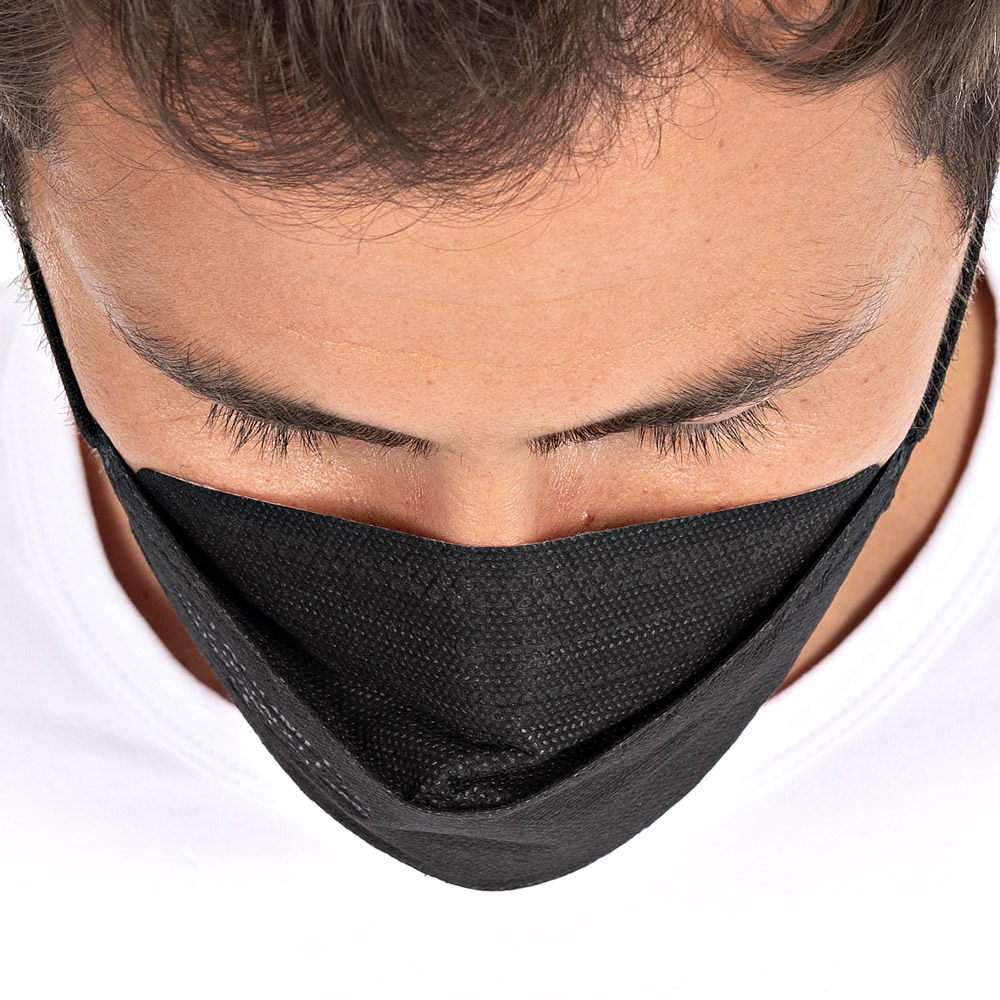 Respirators FFP2 NR, vertically foldable, ear loops made of PP as small pack in black in the top view