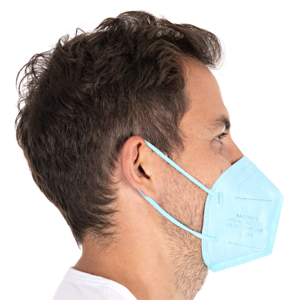 Respirators FFP2 NR, vertically foldable, ear loops made of PP as small pack in blue in the side view