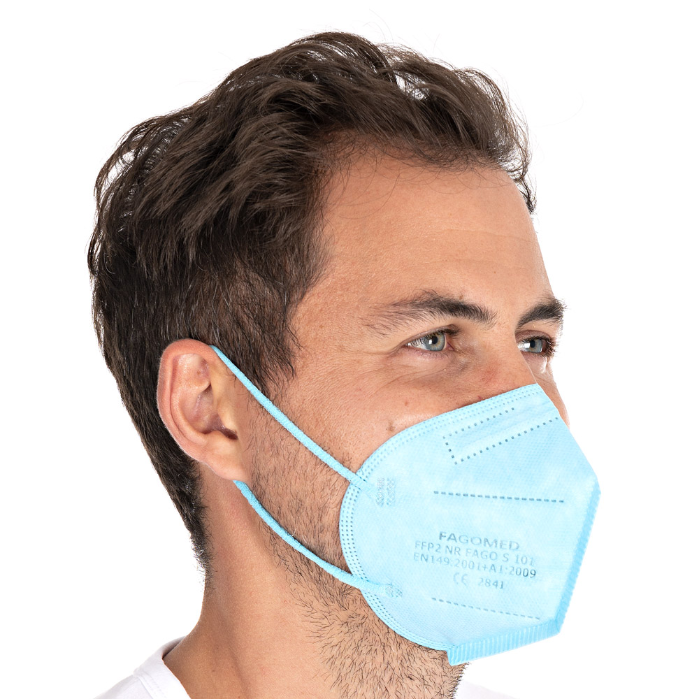Respirators FFP2 NR, vertically foldable, ear loops made of PP as small pack in blue in the oblique view
