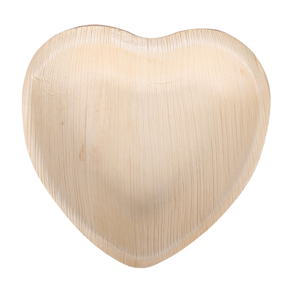 Bowls heart-shaped made of palm leaf with smooth inside