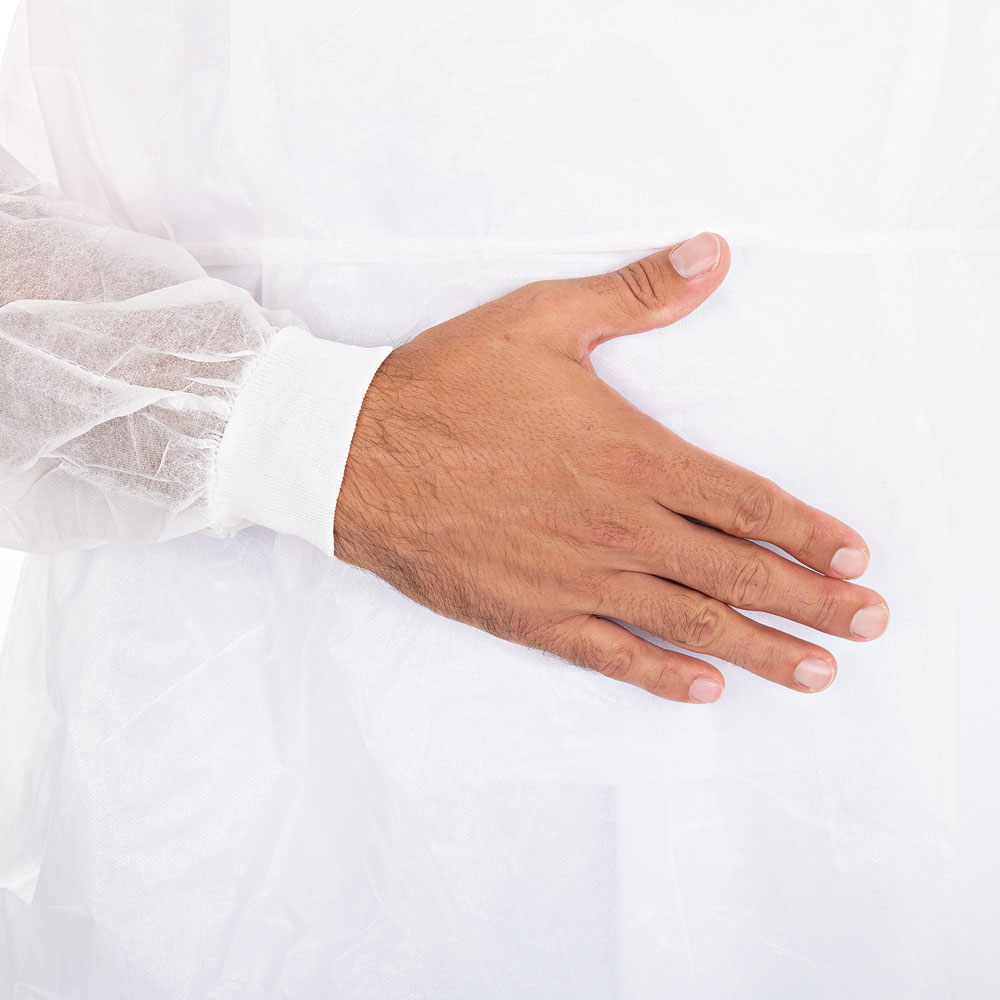 Kittel mit Nackenbindeband aus PP, PE teil-laminiert in weiß mit Strickbündchen am Handgelenk 