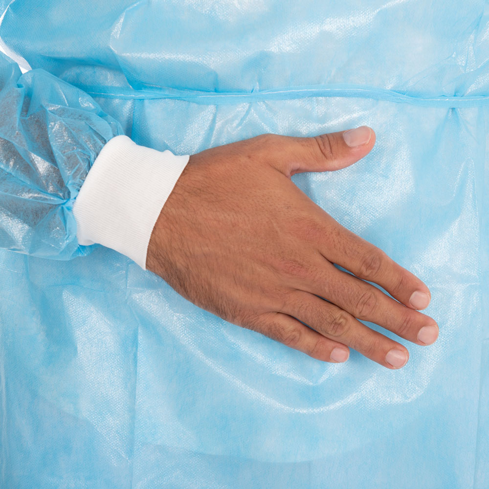 Kittel mit Nackenbindeband aus PP, PE teil-laminiert in blau mit Strickbündchen am Handgelenk
