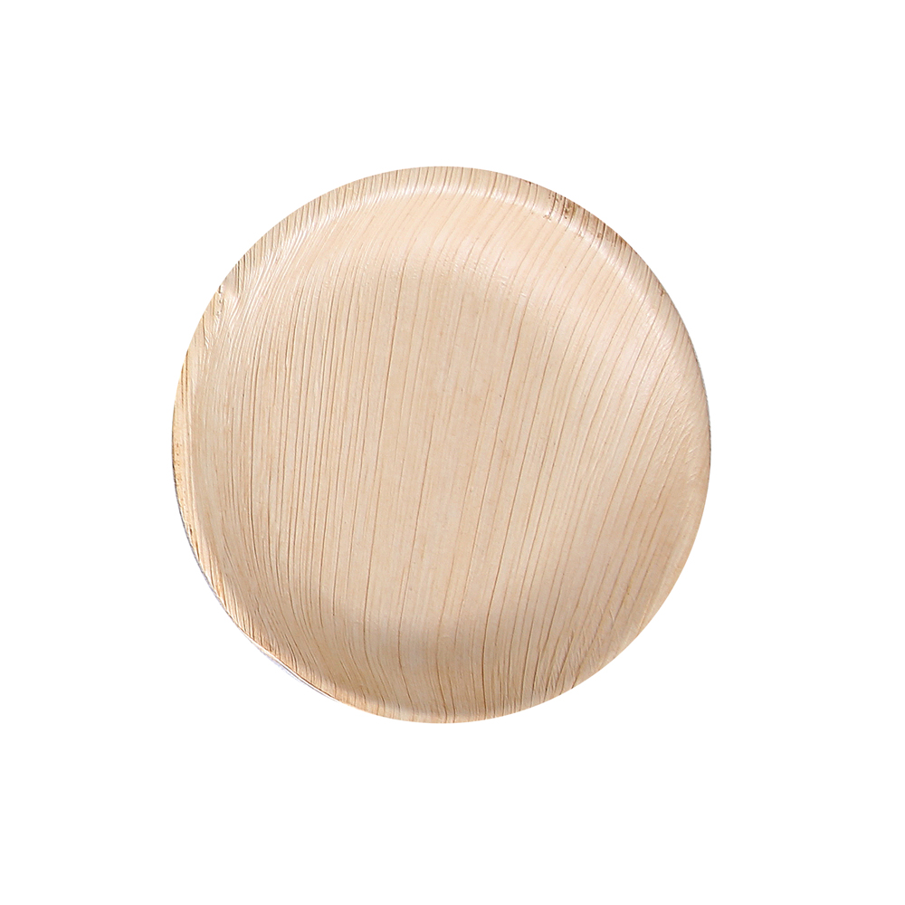 Plates round made of palm leaf in nature with shaped edge